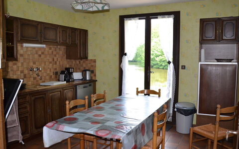 Marchives: Table, Furniture, Cabinetry, Property, Countertop, Chair, Kitchen Appliance, Wood, Lighting, Kitchen