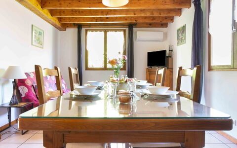 Les Galets: Table, Furniture, Property, Window, Chair, Lighting, Interior Design, Building, Wood, Floor