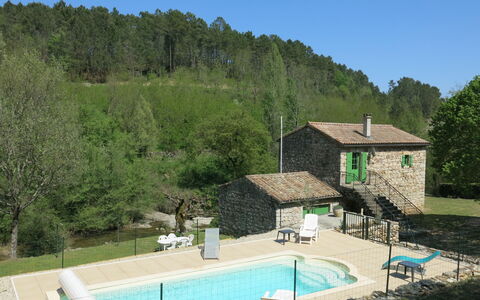 Le Moulin: Water, Plant, Sky, Building, Tree, Swimming Pool, Outdoor Furniture, Land Lot, House, Window