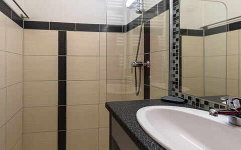 Le Moulin: Mirror, Plumbing Fixture, Property, Tap, Sink, Shower Head, Bathroom, Shower, Shower Panel