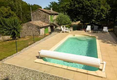 Le Moulin: Water, Building, Plant, Swimming Pool, Tree, Outdoor Furniture, Sky, Rectangle, Shade, Wood