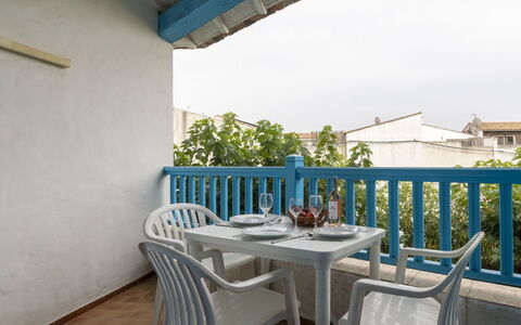 Soleil Camarguais: Table, Property, Building, Furniture, Sky, Chair, Tableware, Plant, Porch, Wood