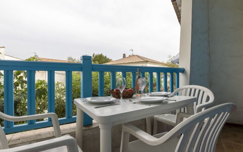 Soleil Camarguais: Table, Sky, Furniture, Chair, Building, Outdoor Furniture, Cloud, Wood, Interior Design, Outdoor Table