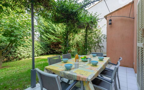 Les Rives du Golf 3: Plant, Furniture, Table, Chair, Building, Outdoor Furniture, Wood, Flowerpot, Shade, Outdoor Table