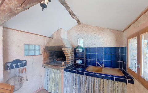 Mas du Combaud: Kitchen, Ceiling, Tile, Chair, Countertop, Plumbing Fixture, Design, Tap, Wood Stain, Kitchen Appliance