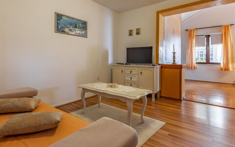 Vladimir: Table, Property, Furniture, Couch, Cabinetry, Wood, Interior Design, Living Room, Comfort, Floor