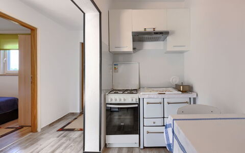 Villa Comottin: Furniture, Property, Cabinetry, Kitchen Stove, Interior Design, Kitchen Appliance, Wood, Flooring, Kitchen, Building
