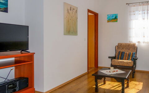 Andjelka: Building, Wood, Picture Frame, Interior Design, Flooring, Floor, Living Room, Wall, Hardwood, Television Set