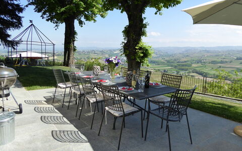 Villa Loreto: Sky, Plant, Property, Table, Furniture, Chair, Shade, Building, Tree, Outdoor Table