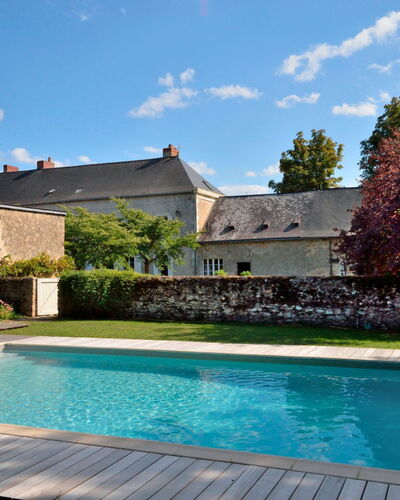 Langevine: Water, Cloud, Sky, Plant, Property, Building, Swimming Pool, Tree, Leisure, Grass