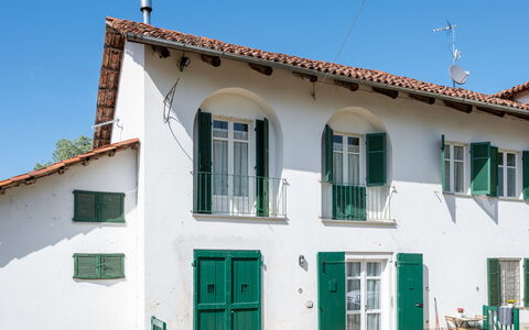 Carroccio Giallo: Sky, Building, Property, Window, Plant, Door, Blue, House, Wood