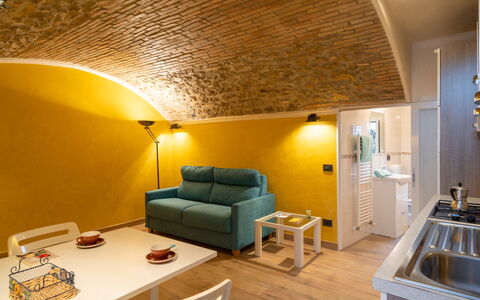 Ernestina: Table, Couch, Furniture, Property, Comfort, Wood, Building, Interior Design, Living Room, Studio Couch