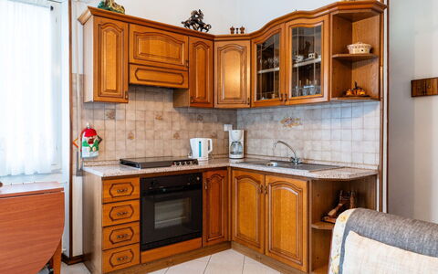 Gialla: Furniture, Cabinetry, Kitchen, Interior Design, Countertop, Wood, Flooring, Kitchen Appliance, Major Appliance, Floor