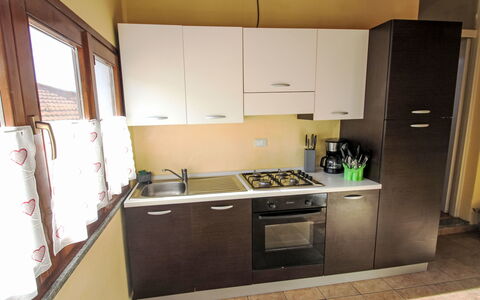 Roma: Kitchen Appliance, Kitchen, Major Appliance, Countertop, Wood, Kitchen Sink, Interior Design, Flooring, Cabinetry, Stove