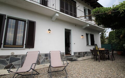 Allegra: Building, Window, Property, Furniture, Plant, Chair, Architecture, Shade, House, Neighbourhood