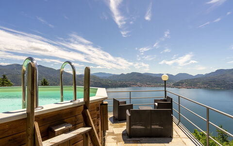 Lo Scoiattolo: Sky, Property, Lake, Azure, House, Mountain, Room, Sea, Real Estate, Ocean