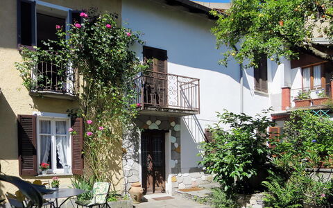 Nicol: Plant, Building, Property, Window, Flower, Azure, Flowerpot, Architecture, Neighbourhood