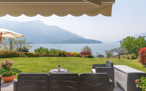 Gabriella: Plant, Water, Sky, Property, Furniture, Azure, Flower, Shade, Outdoor Furniture, Architecture