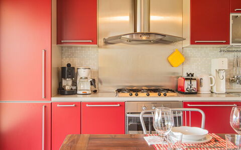 Gabriella: Countertop, Cabinetry, Tableware, Property, Kitchen Appliance, Kitchen, Kitchen Stove, Home Appliance, Wood, Interior Design