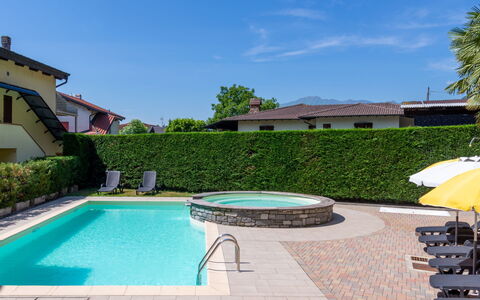Elisa: Water, Plant, Property, Sky, Azure, Swimming Pool, Tree, Building, Shade, Landscape