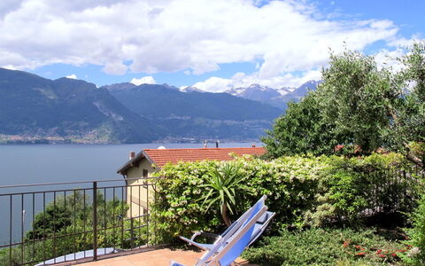 Paníco: Cloud, Sky, Plant, Water, Mountain, Blue, Azure, Outdoor Furniture, Sunlounger, Natural Landscape