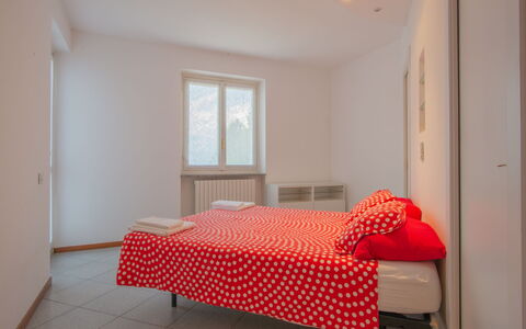 Gaia: Bedroom, Furniture, Room, Bed, Property, Red, Bed Sheet, Bed Frame, Interior Design, Floor