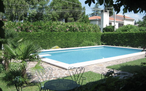 Serena: Water, Plant, Swimming Pool, Sky, Rectangle, Shade, Tree, Grass, Outdoor Furniture, Building