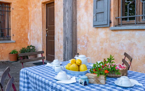 Cascina Villa (Ast231): Table, Plant, Food, Furniture, Window, Tableware, Property, Building, Blue, Flowerpot