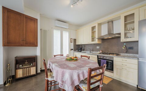 Zia Maria: Cabinetry, Furniture, Property, Countertop, Wood, Table, Kitchen, Lighting, Interior Design, Flooring