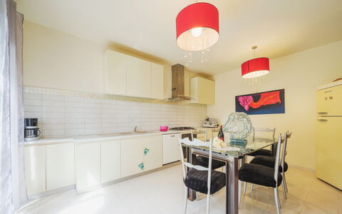 Villa Ulivo: Building, Table, Interior Design, Wood, Flooring, Countertop, Floor, House, Kitchen, Houseplant