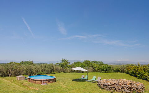 Rustico dei Canali: Sky, Plant, Plant Community, Cloud, Natural Landscape, Tree, Umbrella, Land Lot, Shade, Grass