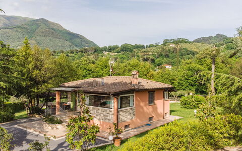 Verde Versilia: Plant, Sky, Cloud, Property, Building, Plant Community, Mountain, Window, Natural Landscape, Tree