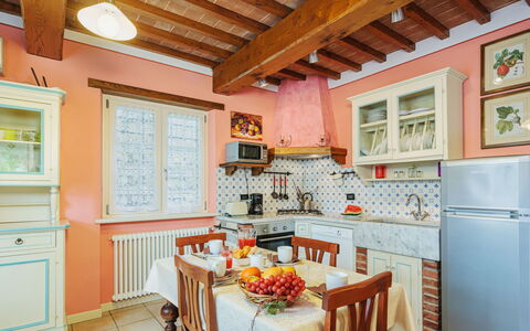 Verde Versilia: Furniture, Property, Cabinetry, Table, Window, Wood, Interior Design, Kitchen, Countertop, Lighting