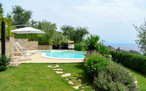 Villa i Cipressi: Property, Grass, Swimming Pool, Lawn, Natural Landscape, Backyard, Garden, Yard, Landscape, Real Estate