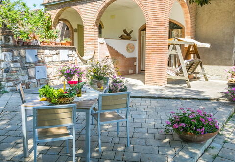 Borgo Antico: Flower, Plant, Building, Flowerpot, Houseplant, Botany, Chair, House, Outdoor Furniture, Road Surface