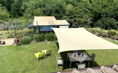 Pianelli: Plant, Plant Community, Furniture, Tent, Table, Tree, Outdoor Furniture, Shade, Land Lot, Chair