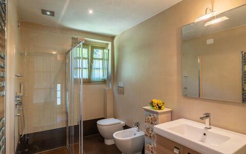 Nido del Sorbino: Bathroom Cabinet, Tap, Property, Plumbing Fixture, Sink, Bathroom Sink, Cabinetry, Mirror, Bathroom