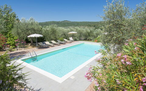 Le Terrazze: Water, Plant, Sky, Swimming Pool, Chair, Azure, Outdoor Furniture, Tree, Building, Shade
