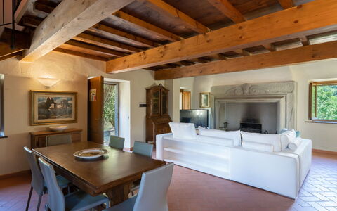 Villa: Furniture, Property, Table, Building, Wood, Picture Frame, Interior Design, Flooring, Floor, Living Room