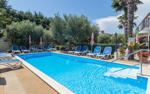 Poreč 649: Water, Sky, Building, Cloud, Swimming Pool, Blue, Tree, Shade, Chair, Outdoor Furniture