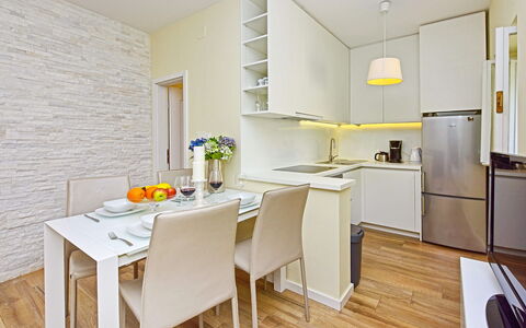 Poreč Kaštelir 656: Furniture, Cabinetry, Table, Countertop, Kitchen, Tableware, Wood, Interior Design, Flooring, Chair