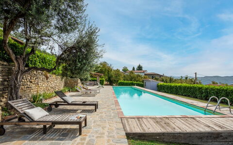 Cortemilia 602: Plant, Water, Sky, Property, Cloud, Swimming Pool, Tree, Outdoor Furniture, Grass, Arecales
