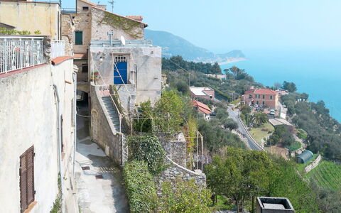 Mare (Flg136): Sky, Water, Building, Azure, Window, Plant, Mountain, Urban Design, House
