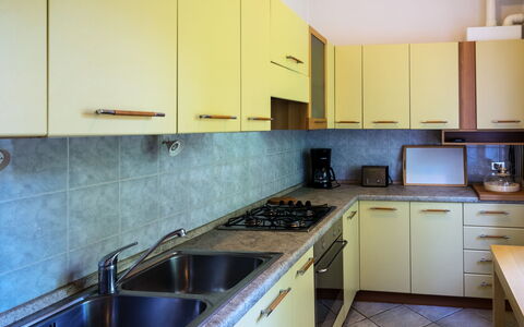 Del Sole: Countertop, Property, Room, Kitchen, Cabinetry, Furniture, Yellow, Building, Interior Design, House