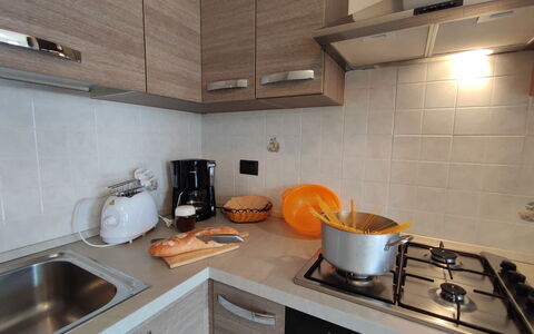 La Trave: Brown, Property, Kitchen Sink, Countertop, Cabinetry, Sink, Kitchen, Kitchen Stove, Kitchen Appliance, Wood