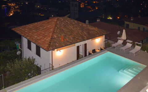 Viola: Water, Building, Property, Swimming Pool, Light, Azure, Plant, Lighting, Window, Architecture