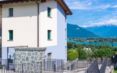 Azalea (Gla103): Cloud, Sky, Property, Building, Plant, Blue, Azure, Mountain, Architecture, Window