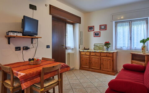 Gera Lario 690: Furniture, Cabinetry, Plant, Houseplant, Television, Building, Window, Wood, Door, Comfort