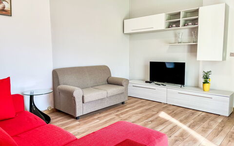 Pippo: Furniture, Interior Design, Flooring, Couch, Floor, Wood, Room, Living Room, Television, Ceiling