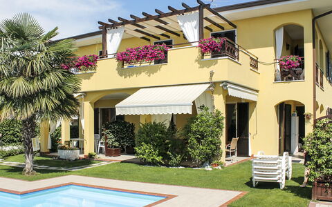 Lazise 712: Plant, Building, Property, Sky, Window, Cloud, Water, Shade, Tree, House